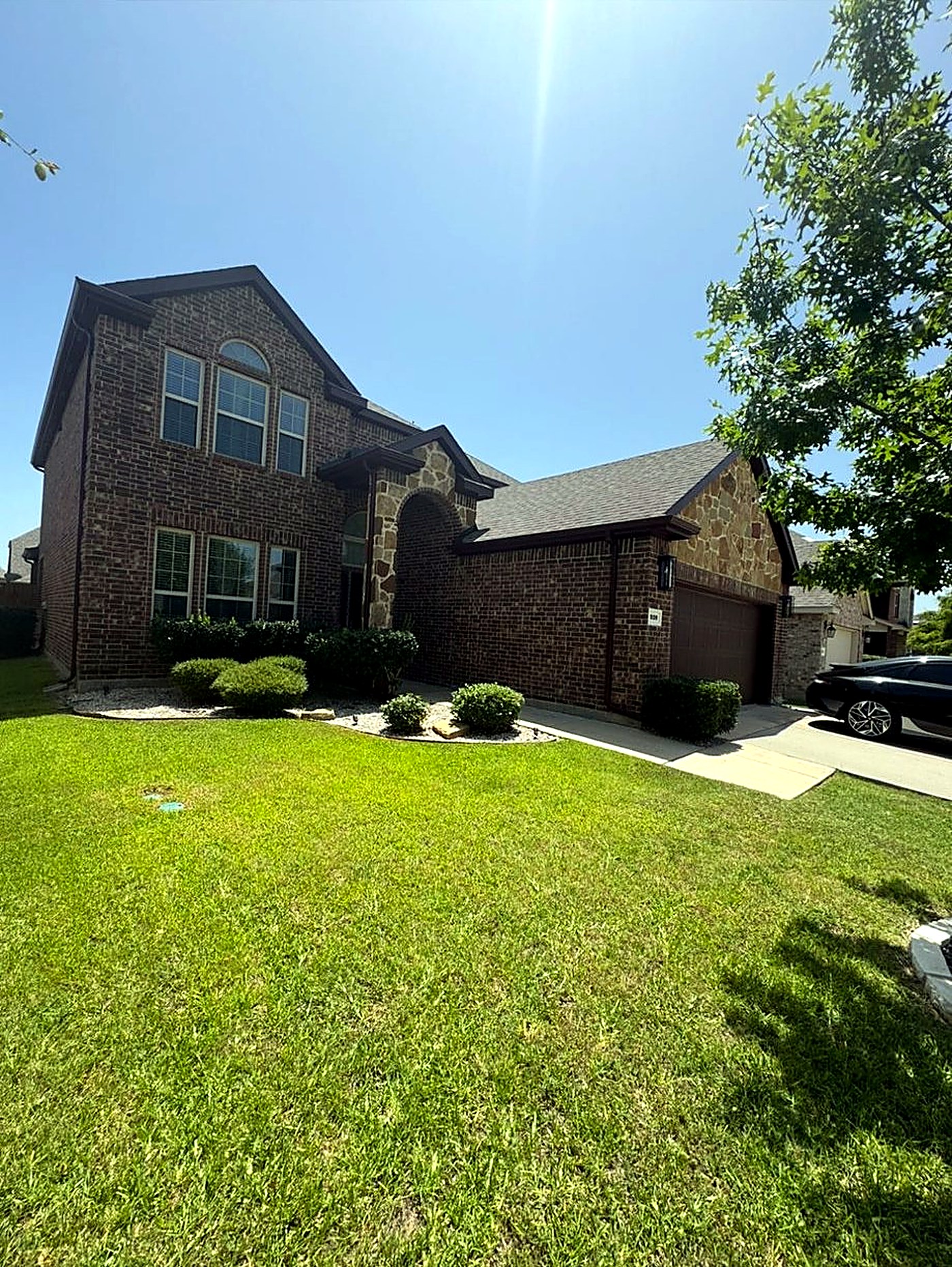 Completed exterior repaint finished in brown