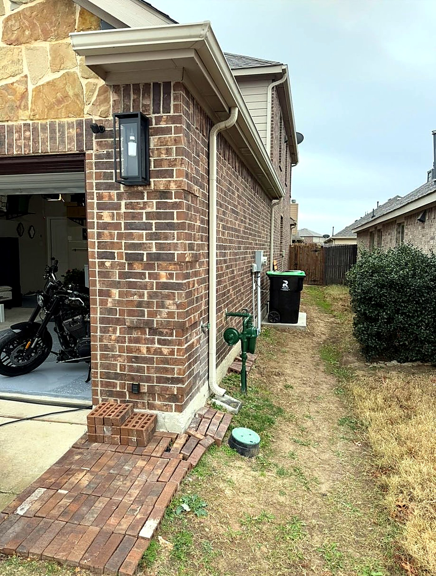 Side yard before paver pathway installation